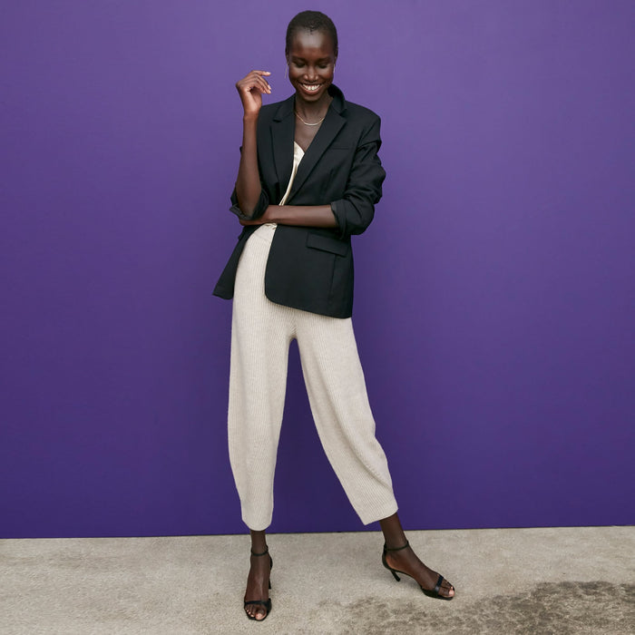 Front image of a woman standing wearing the Addison Jogger—Cashmere/Wool in Oatmeal Melange