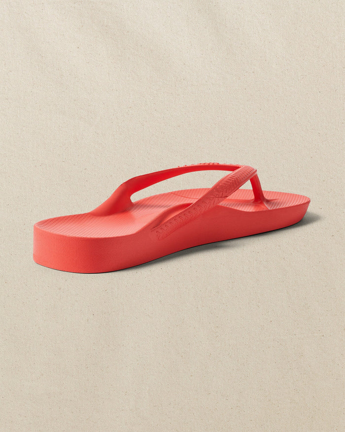The right back view of the Southern Tide Archie's Coral Arch Support Flip Flop by Southern Tide - Coral