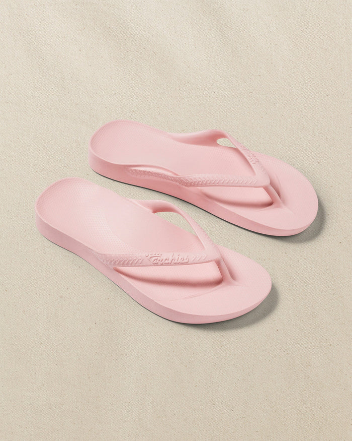 The front view of the Southern Tide Archie's Soft Pink Arch Support Flip Flop by Southern Tide - Soft Pink