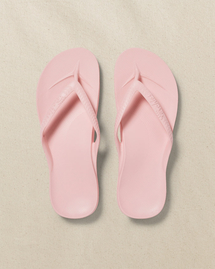 The top view of the Southern Tide Archie's Soft Pink Arch Support Flip Flop by Southern Tide - Soft Pink