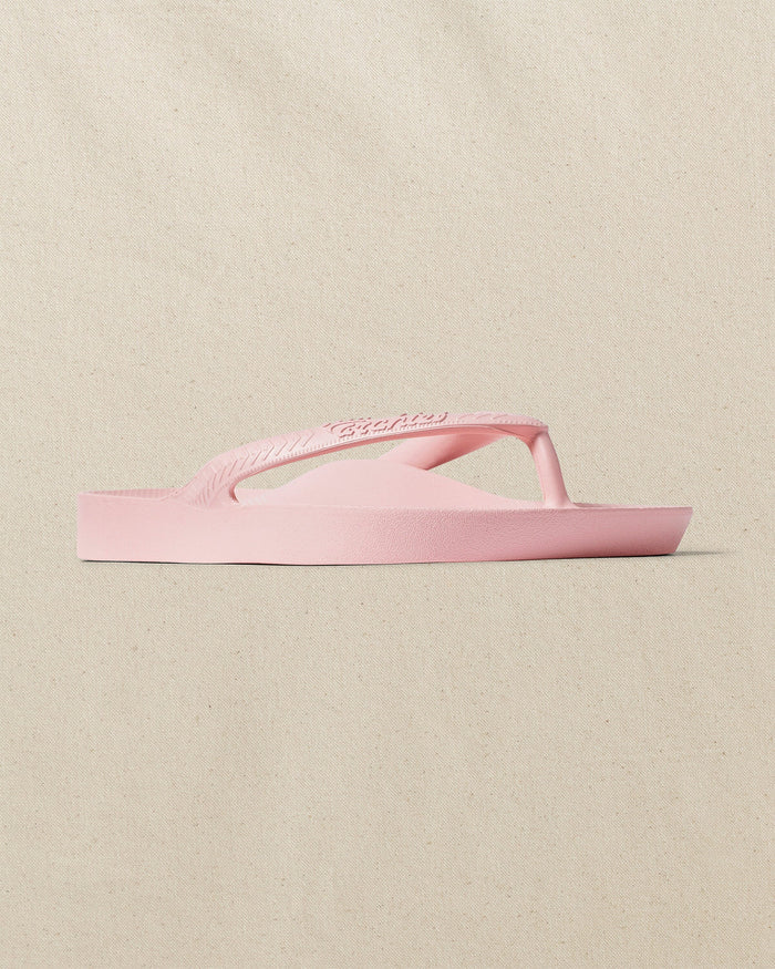 The right angle view of the Southern Tide Archie's Soft Pink Arch Support Flip Flop by Southern Tide - Soft Pink