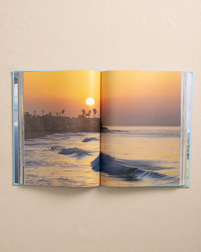 The detail view of the Johnny Vacay Beach Bum Book at Southern Tide - White