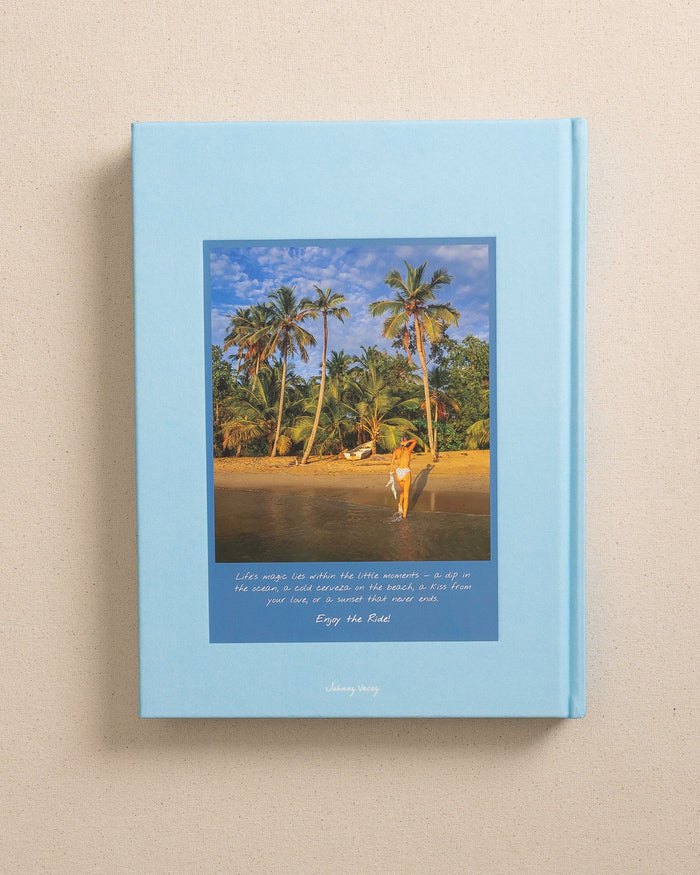 The back view of the Johnny Vacay Beach Bum Book at Southern Tide - White