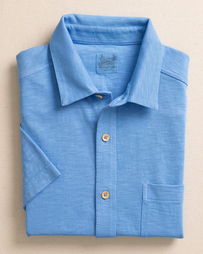 The front view of the Southern Tide Beachcast Solid Knit Short Sleeve Sport Shirt by Southern Tide - Boat Blue
