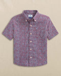 The front view of the Southern Tide Boys Fireworks Coastal Breeze® Short Sleeve Sport Shirt by Southern Tide - Channel Marker Red