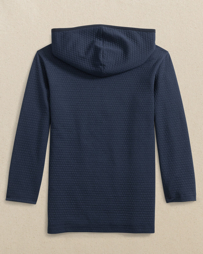 The back view of the Southern Tide Boys Scuttle Hoodie by Southern Tide - Heather True Navy