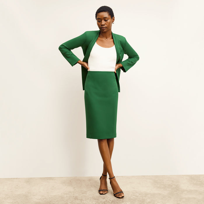 front image of a woman wearing the chantal skirt in shamrock