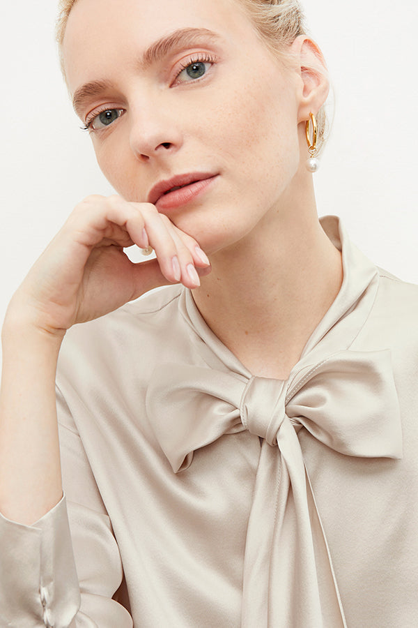 woman wearing the claude charms in gold | Exclude