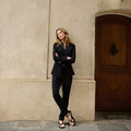 Front image of a woman standing wearing the Colby Jogger in Black | Lead