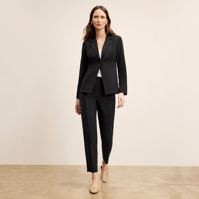 Front image of a woman standing wearing the Colby Jogger in Black