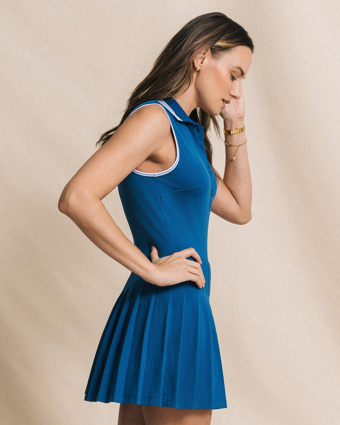 The side view of the Southern Tide Ella Sleeveless Pleated Tennis Dress by Southern Tide - Nautical Blue