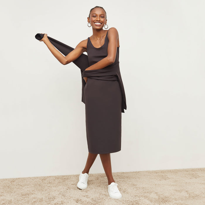 Front image of a woman standing wearing the Elsa Dress—Light Scuba in Haze | Lead