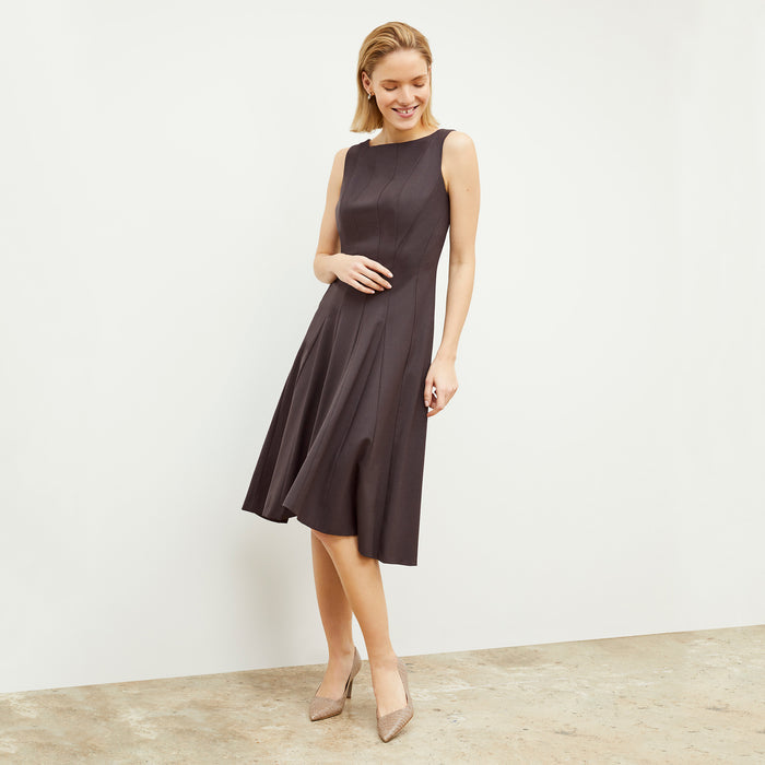 Front image of a woman standing wearing the Gabriella Dress in Haze