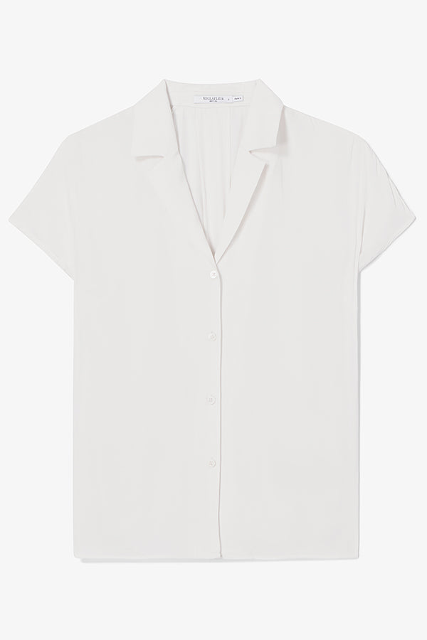 White blouse on a white background | Exclude | Still