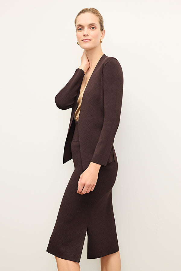 side image of a woman wearing the Harlem Skirt in Chocolate | Exclude | Grid