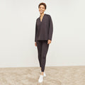 Front image of a woman standing wearing the Harrington Legging—Light Scuba in Haze | Lead