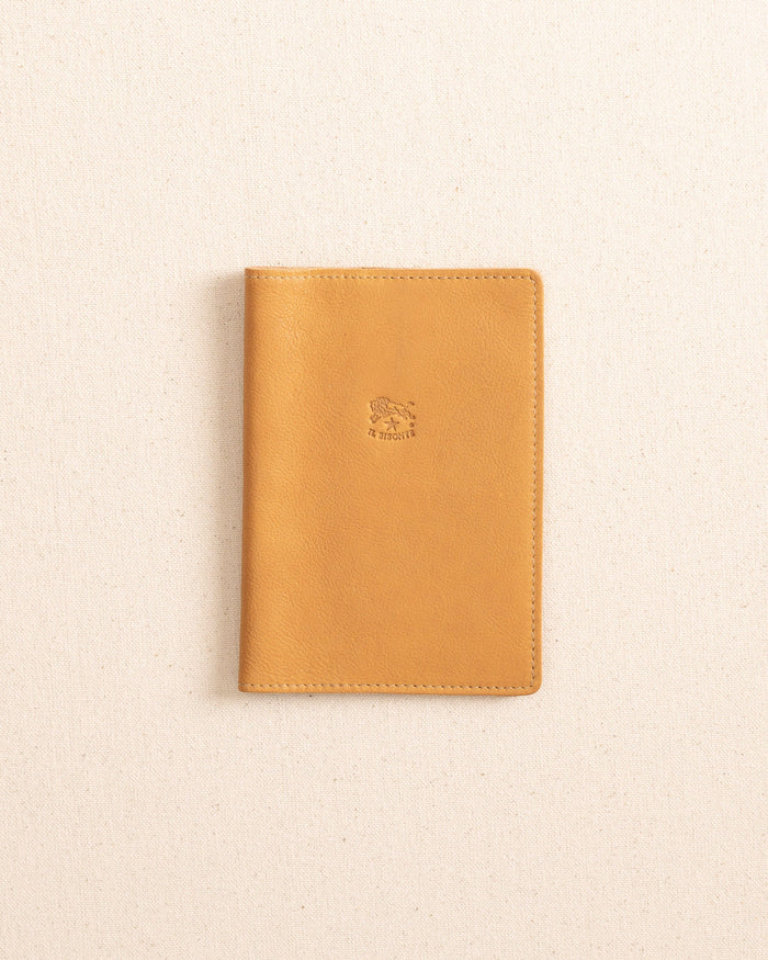 The front view of the Il Bisonte Passport Case at Southern Tide - Natural