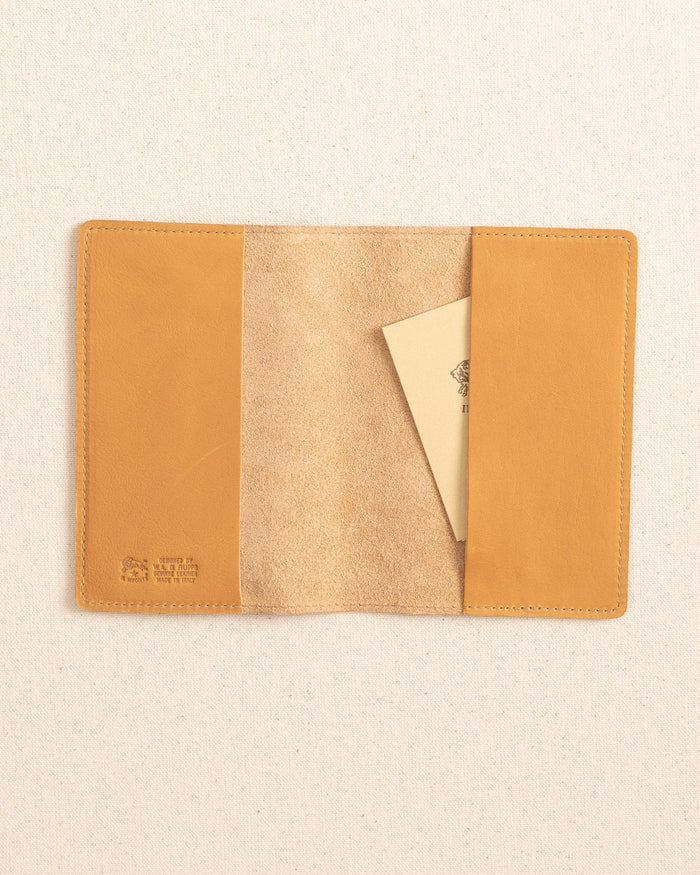 The inside view of the Il Bisonte Passport Case at Southern Tide - Natural