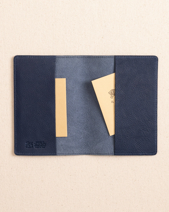 The inside view of the Il Bisonte Passport Case at Southern Tide - Blue