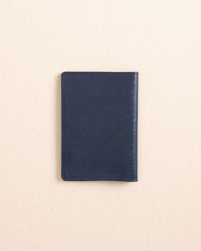 The back view of the Il Bisonte Passport Case at Southern Tide - Blue