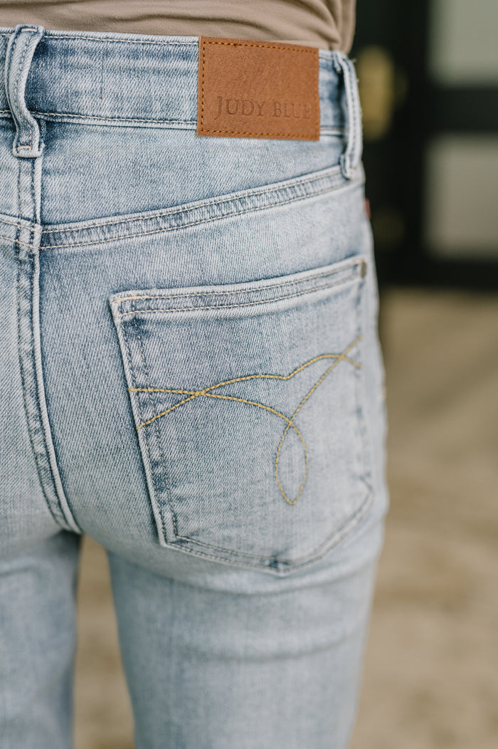 Judy Blue Mckaylee Mid Rise Kick Flare Jeans with Frayed Hem