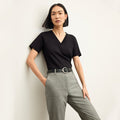 front image of a woman wearing the Lee T-Shirt in Black | Lead