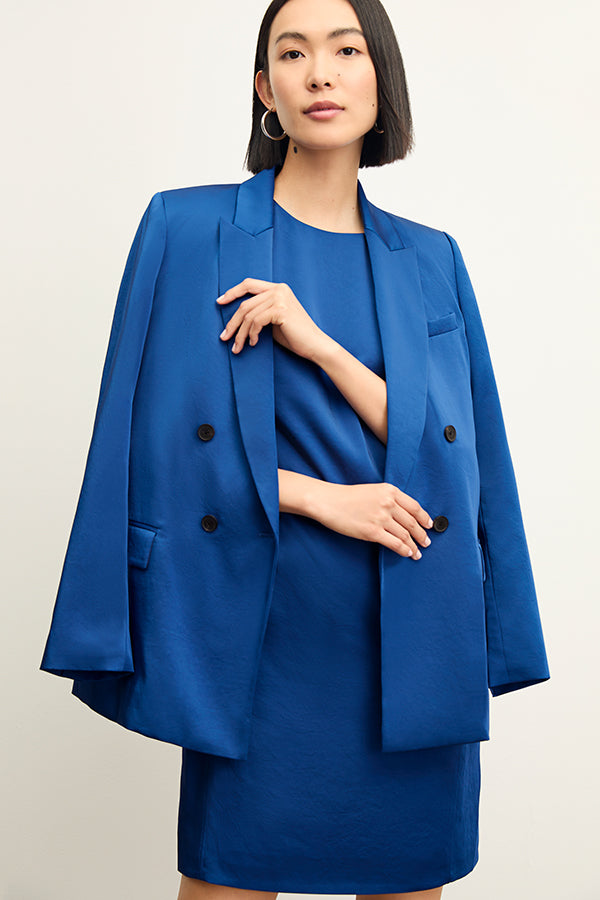 Front image of a woman wearing the maaza dress in sapphire | Exclude | Grid Hover