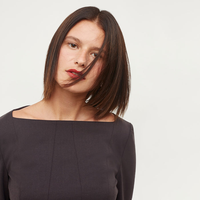 Detail image of a woman standing wearing the Rivka Top in Haze