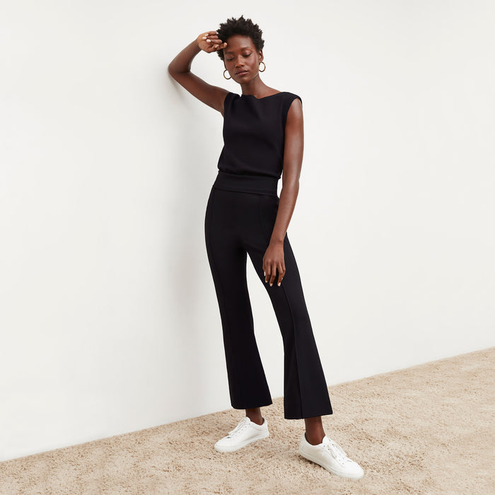 Front image of a woman standing wearing the Shiloh Pant in Black