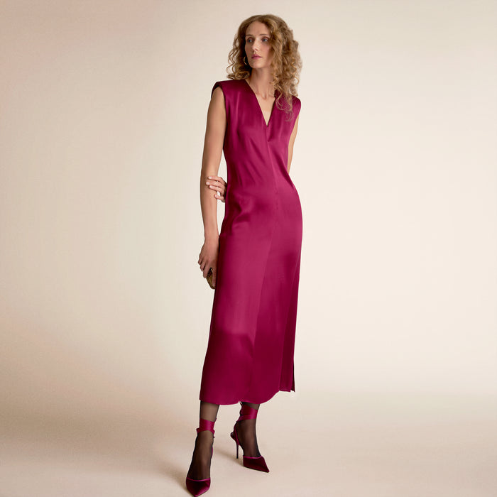 Woman wearing a dark fuchsia dress | Lead