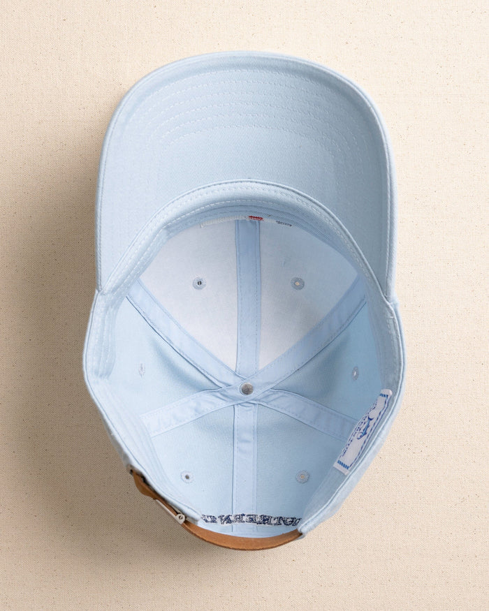 The under view of the Southern Tide ST Flag Leather Strap Hat by Southern Tide - Blue