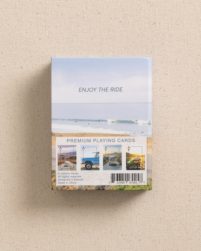 The back view of the Johnny Vacay Surf Rides Playing Cards at Southern Tide - White
