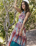 The lifestyle view of the Southern Tide Whitley Madras Midi Dress by Southern Tide - White Sand