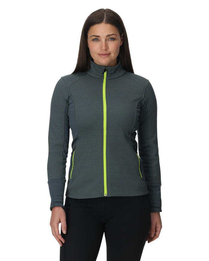 Woman wearing a gray jacket with a green zipper on a white background