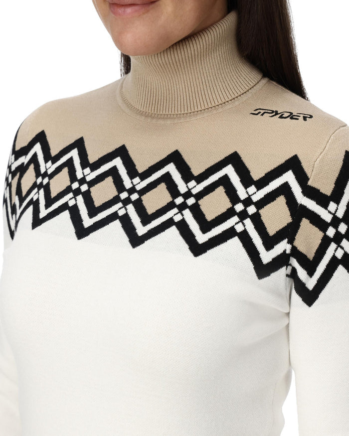 Beige sweater with geometric pattern and Spider logo on a white background